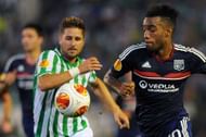 SEVILLE, SPAIN - SEPTEMBER 19:  Alexandre Lacazette (R) of Olympique Lyonnais and Markus Steinhofer of Real Betis Balompie in action during the UEFA Europa League group stage match between Real Betis Balompie and Olympique Lyonnais held on September 19, 2013 at the Benito Villamarin Stadium, in Seville, Spain. (Photo by Jorge Guerrero/EuroFootball/Getty Images)